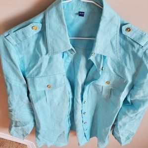 100% turquoise blue linen female shirt.